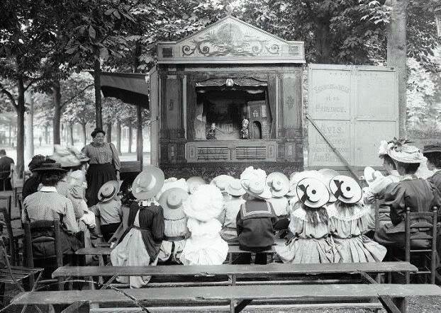 Puppet theatre show in luna park in Paris, 1910